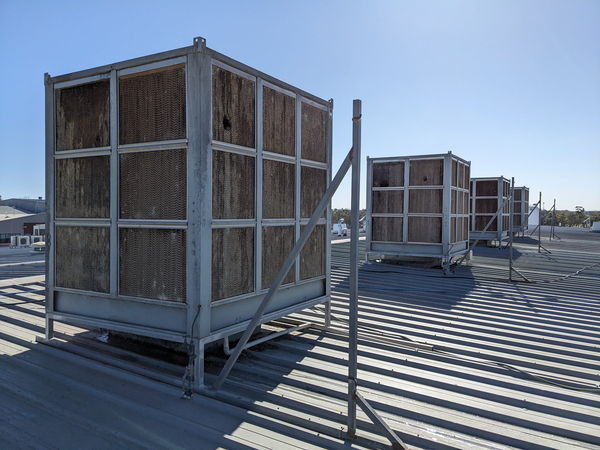 Evaporative cooling units on a commercial rooftop