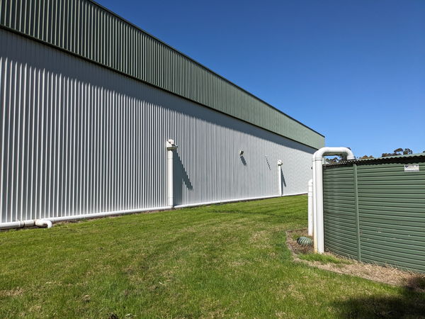 Warehouse wall and rainwater downpipes